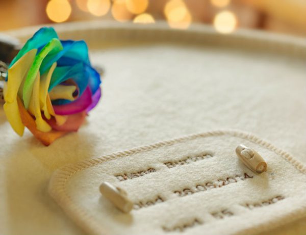 Rainbow rose on natural wool woolen coffin casket